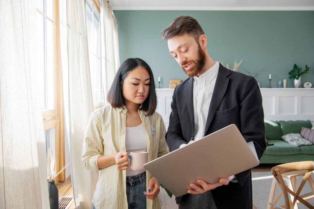 Woman talking to a mortgage lender about mortgage insurance.