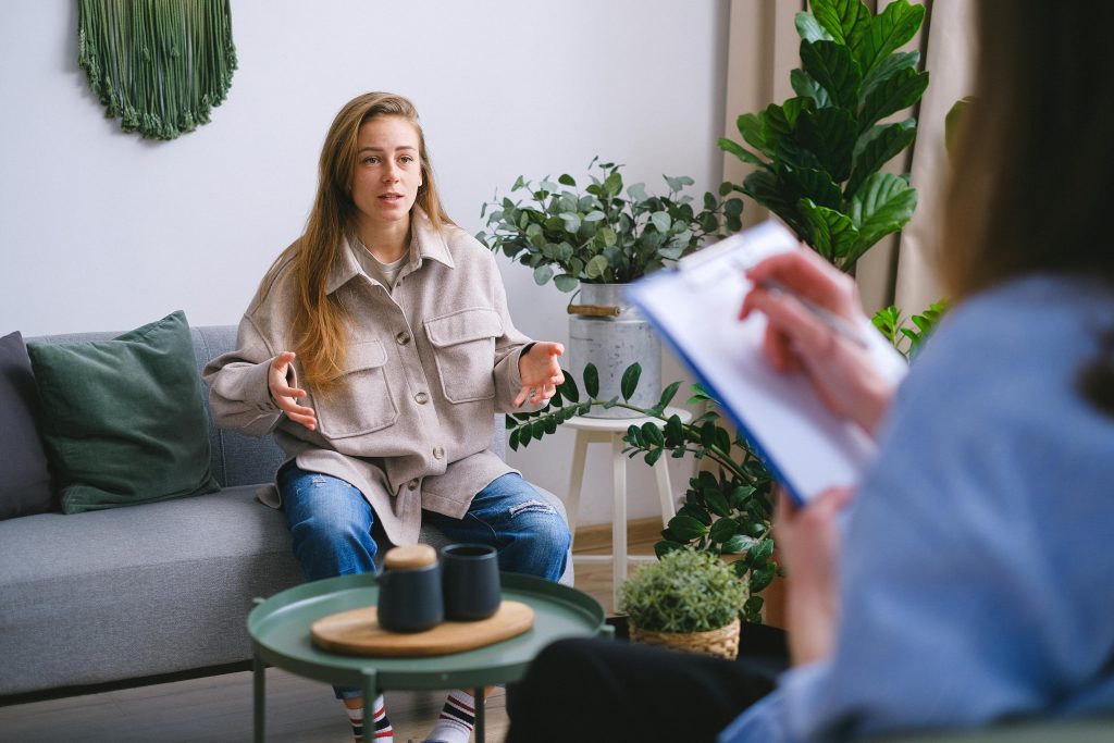 A woman deciding between credit counseling and debt settlement