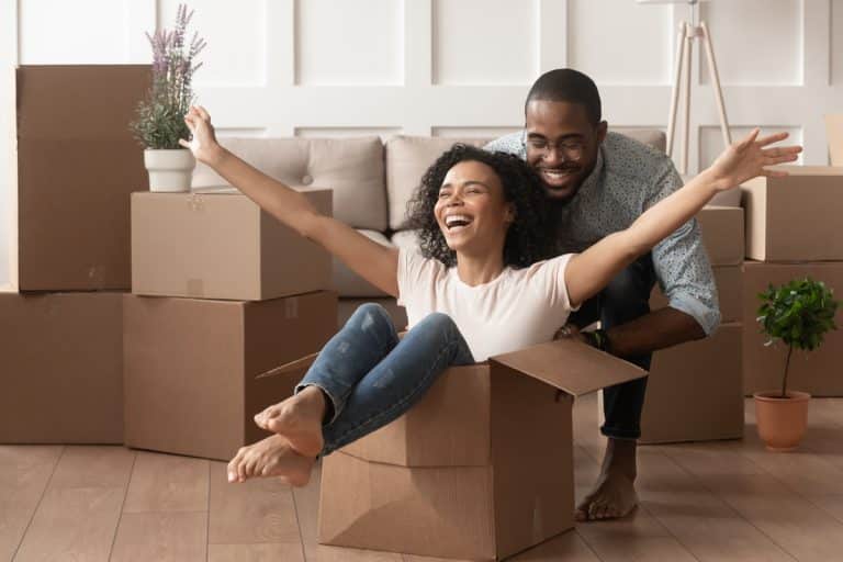 First time home buyer couple enjoying their new house.