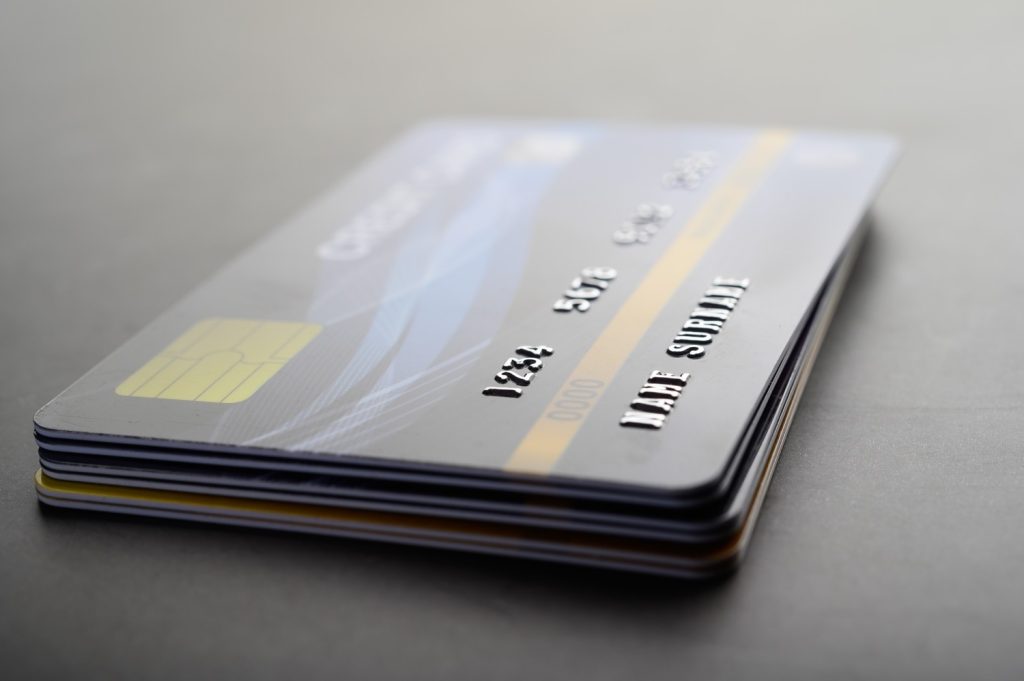 Credit builder cards neatly stacked together