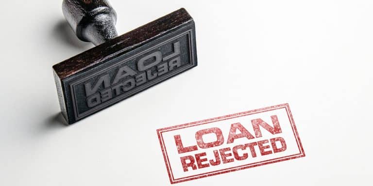 A stamp that reads "Loan Rejected".