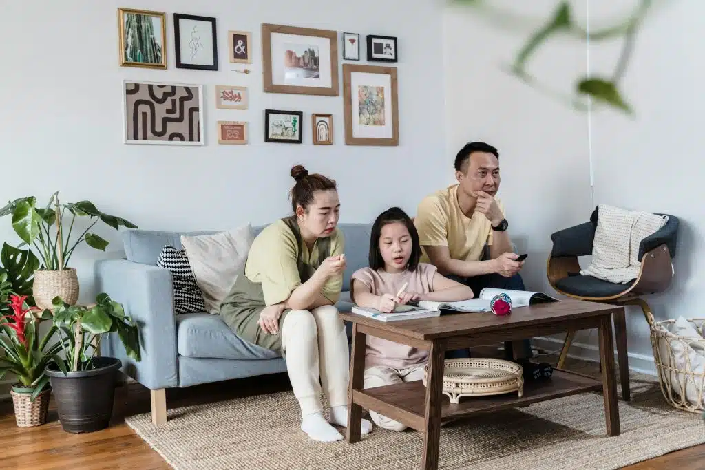 A family sitting together, discussing the future