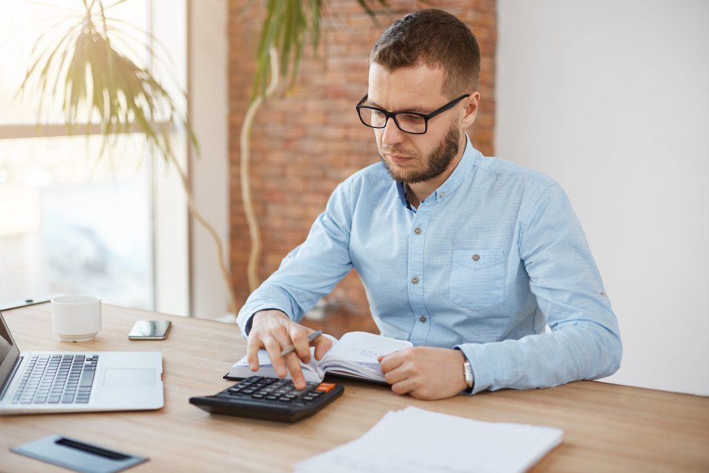 Man calculating residual value