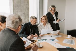 People in a wirehouse office's having a meeting