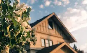 A house at the back of flowers, types of real estate ownership