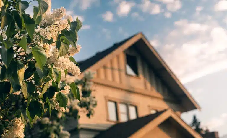 A house at the back of flowers, types of real estate ownership