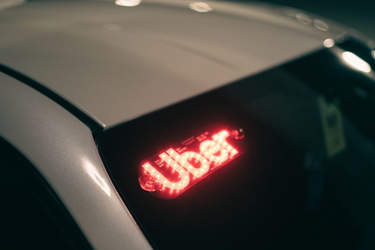 Car front window with Uber lights for Uber news today
