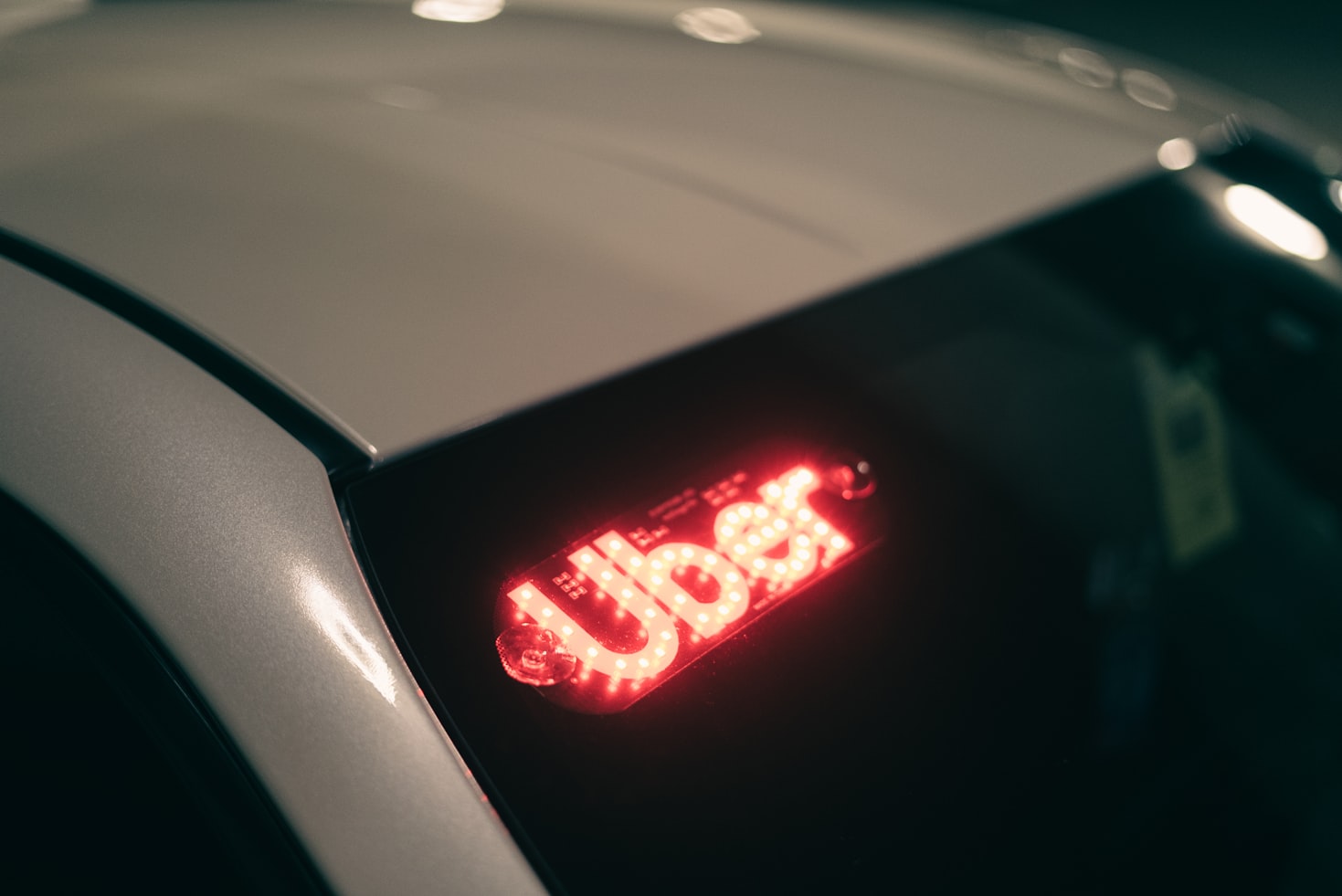 Car front window with Uber lights for Uber news today