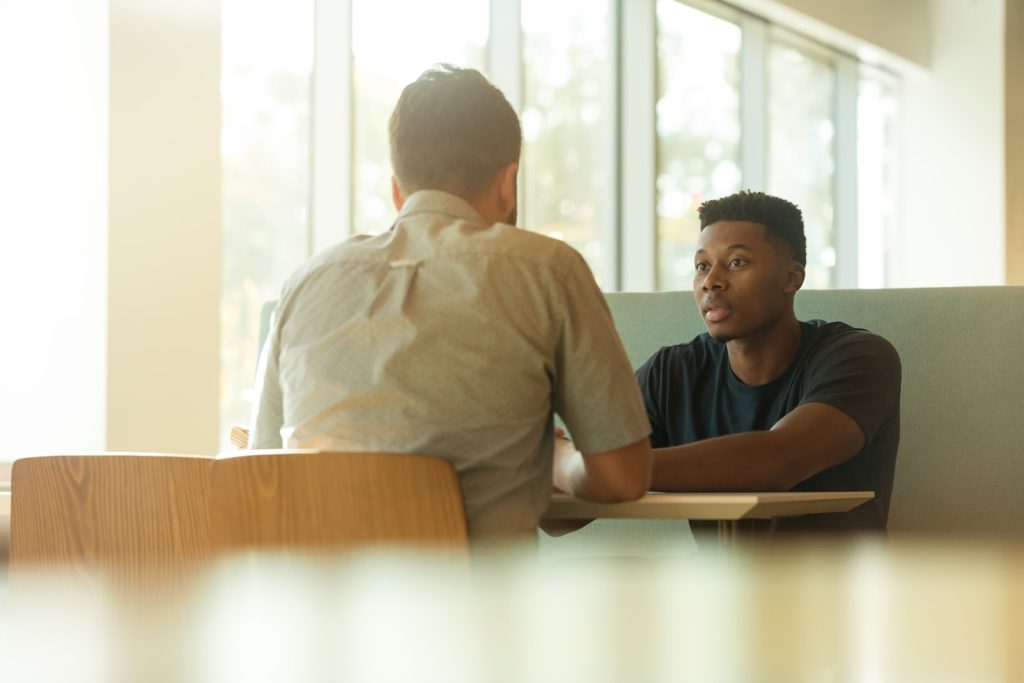 Two men talking about forming an LLC