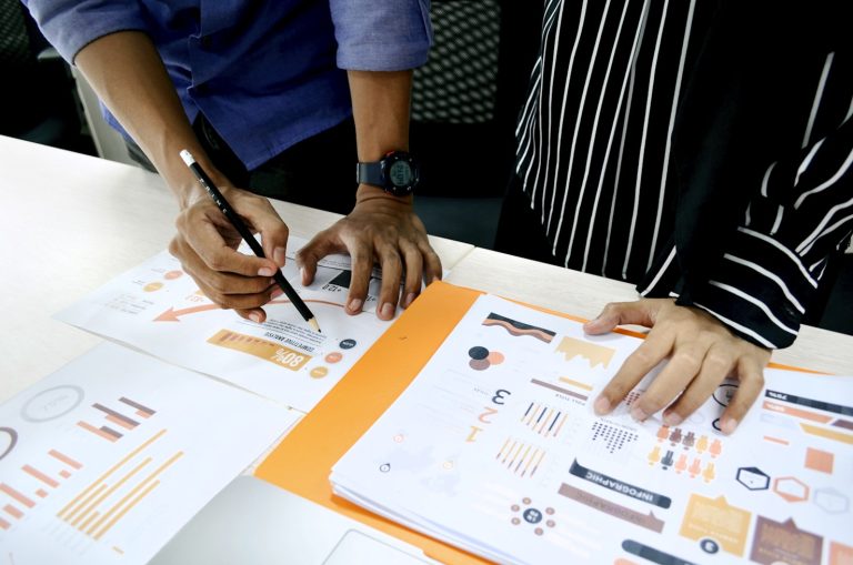 Marketing team doing competitive pricing research