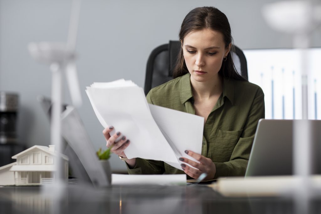Employee reading documents