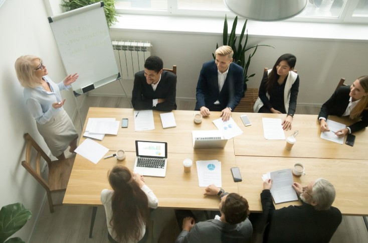 Woman giving business presentation about contribution margin