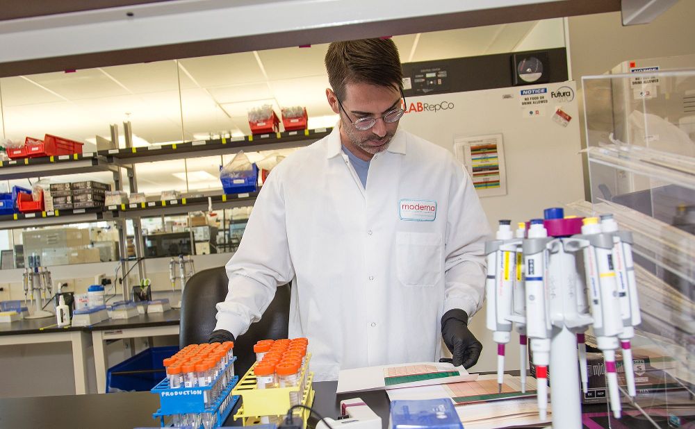 Scientist working in Moderna lab for Moderna news