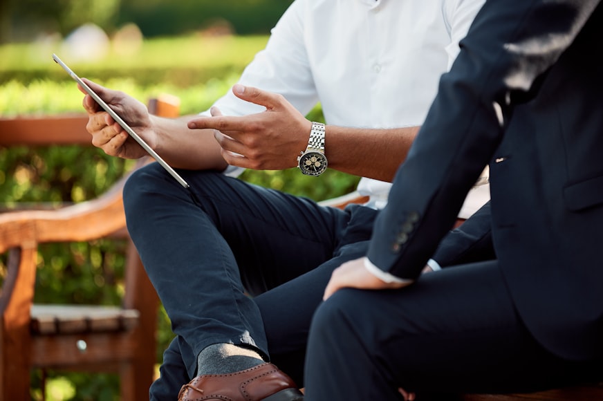Person talking to a financial advisor about the roles of being a policyholder