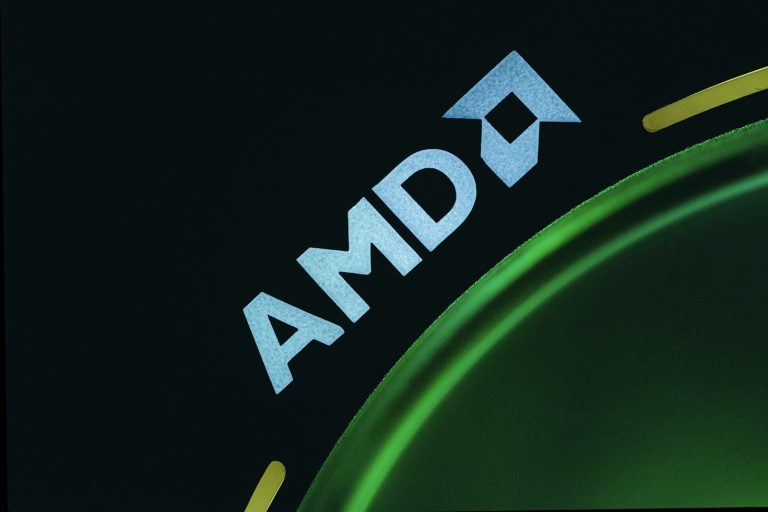AMD logo on a black and green background for AMD news today