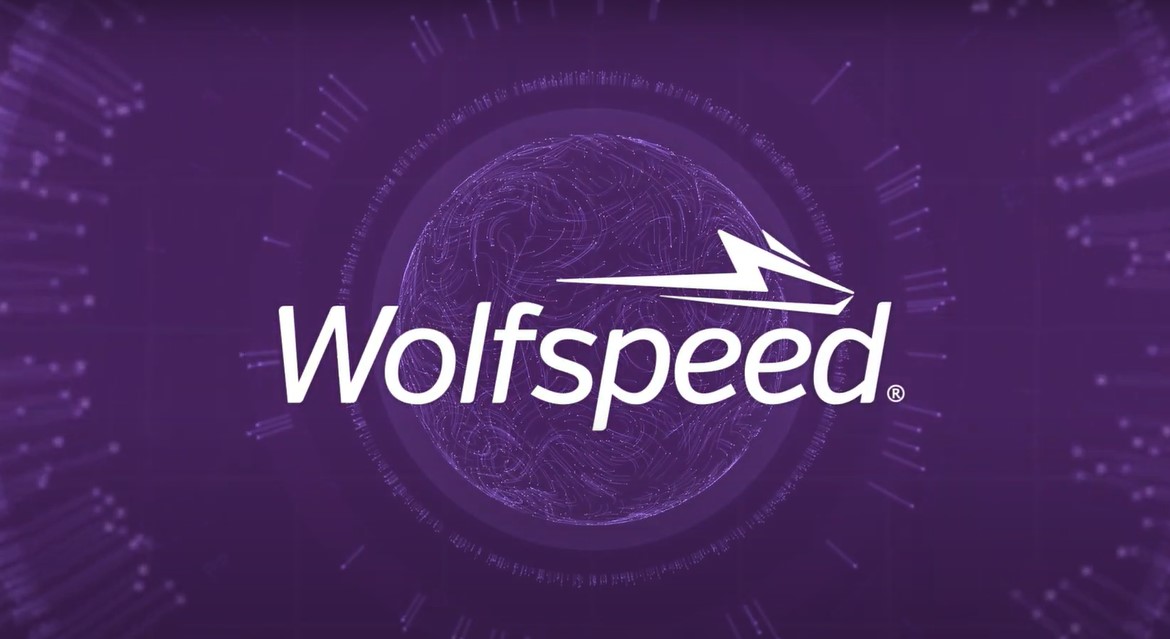 Wolfspeed logo on a purple graphic background