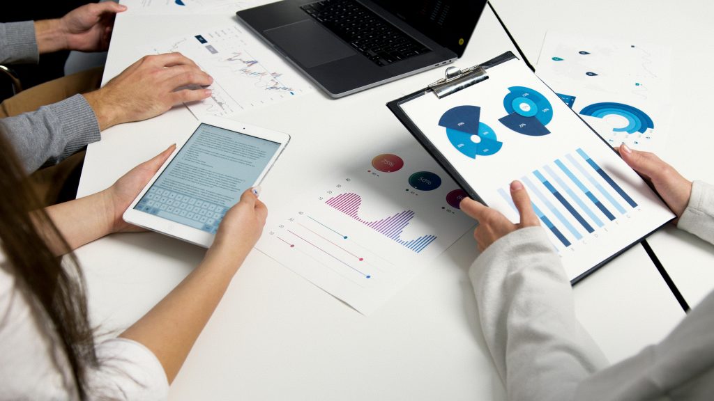 People discussing and calculating EBITDA