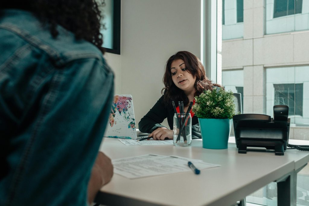 Person talking to a surety company about indemnity bond