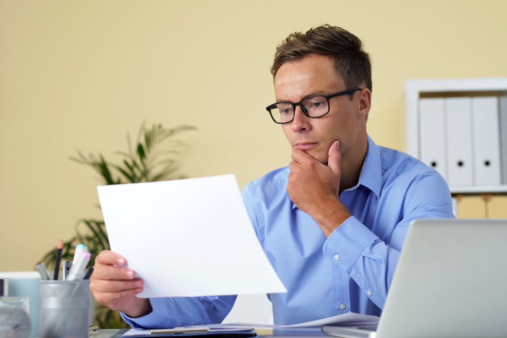 Man reading important rental history report