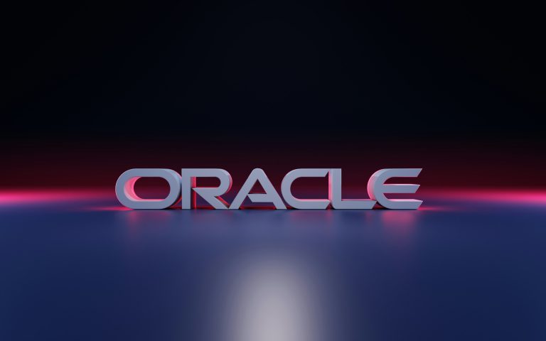 Oracle wordmark in 3D silver letters with neon pink-blue backlighting on a dark reflective surface