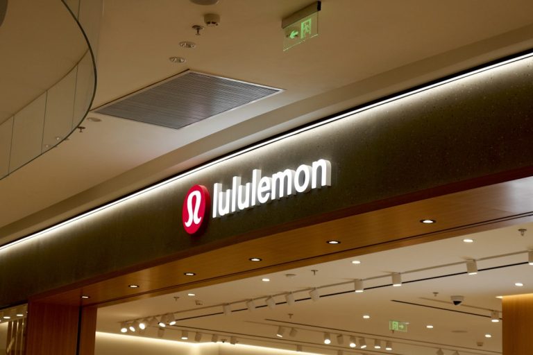 Medium close up of a Lululemon storefront for Lululemon news