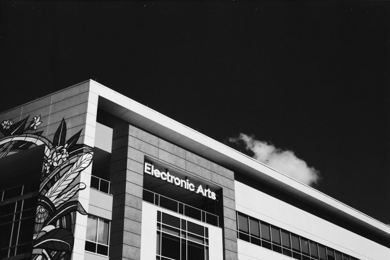 Electronic Arts headquarters building exterior with modern architecture and mural artwork in black and white