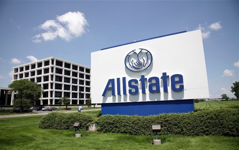 Allstate insurance headquarters with company logo sign outside corporate office building.