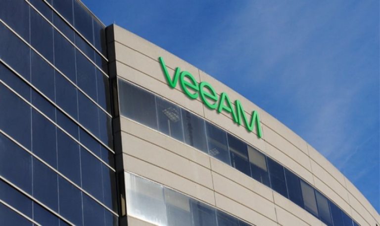 Veeam Software headquarters building with company logo on exterior under blue sky.