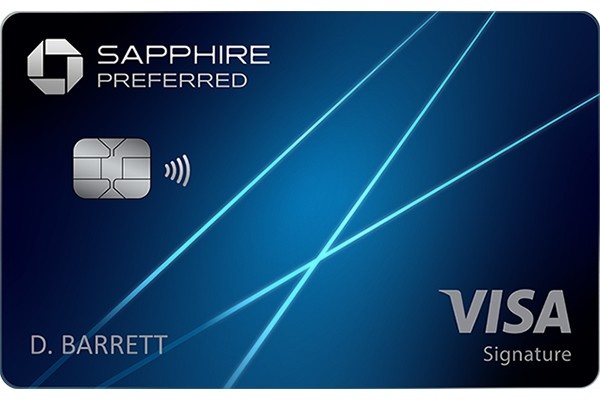 Chase Sapphire Preferred credit card in deep blue with silver diagonal light streaks, chip, and contactless payment symbol. Cardholder name: D. Barrett. Visa Signature.