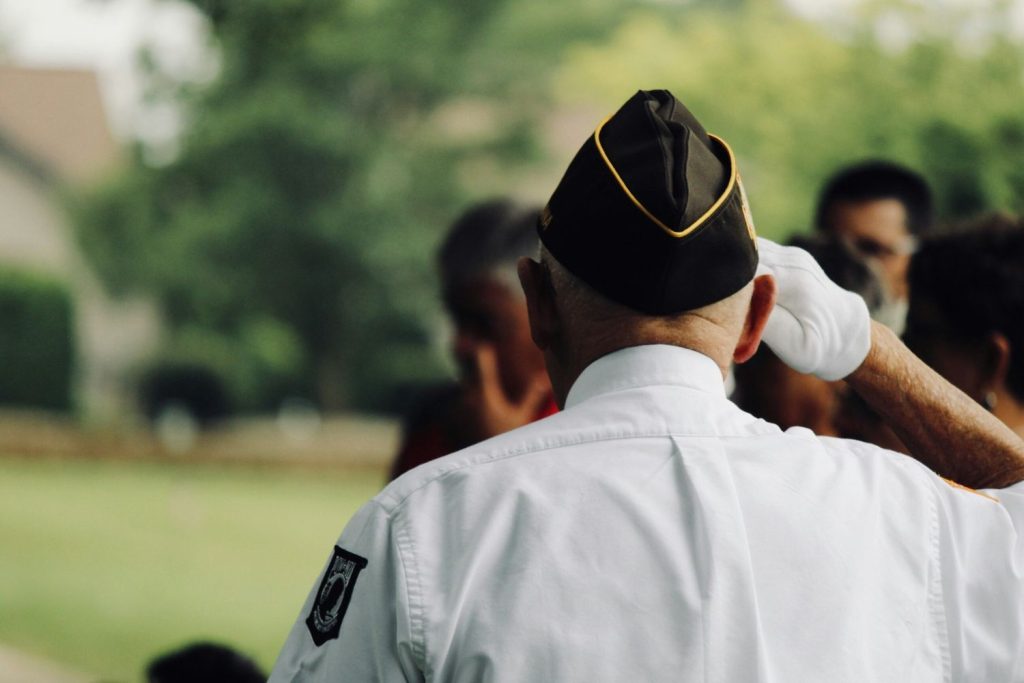 Military veteran saluting, representing service members eligible for VA loans home benefits