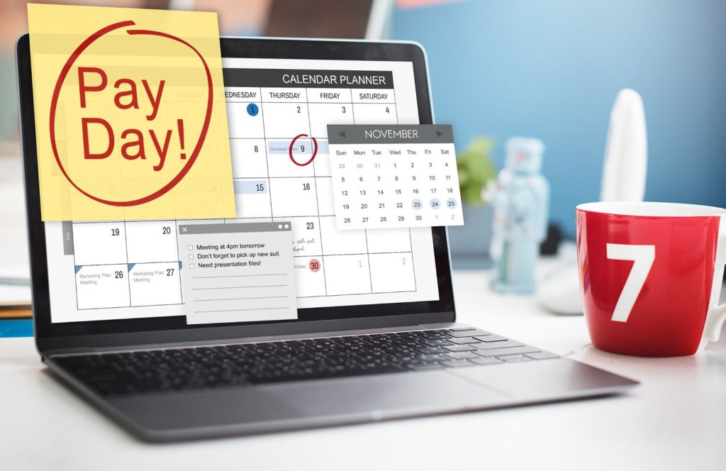 Calendar marking payday reminders to illustrate payday loans explained and repayment timing.