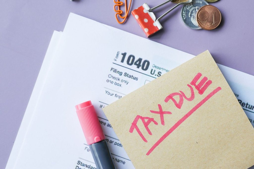 Tax return form with a Tax Due note highlighting an offer in compromise option for resolving IRS debt.